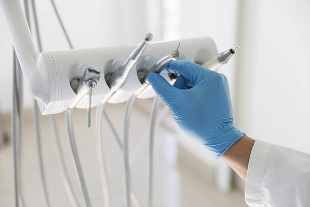 Professional Tooth Extraction technician working in Augusta, KS